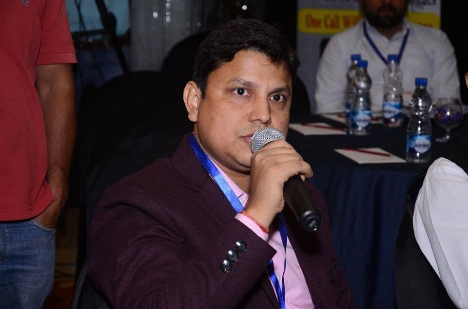 Manish Raman speaking at a marketing event